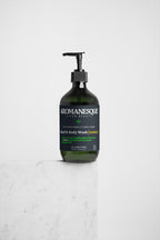 A pump bottle of Aromanesque Hand & Body Wash with patchouli and amber vanilla scents, 490ml.