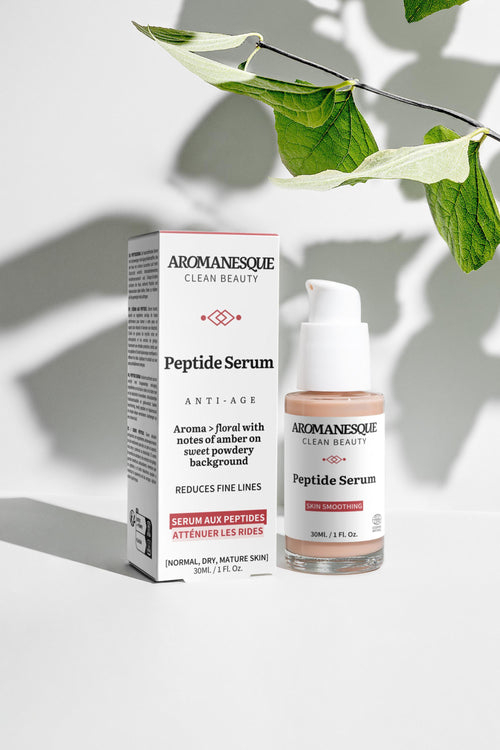 Aromanesque Peptide Serum packaging with a bottle on a light background